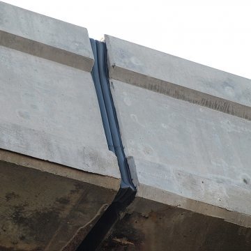 Bridge expansion joint at parapet with Kickout Termination from EMSEAL