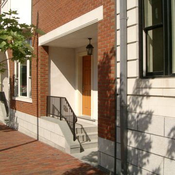 Hard to see wall expansion joint is invisible to the casual patron as the result of considered placement, shadows