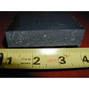 Conservatively Loaded: A sample of lightly loaded resin shows a good balance of aggregates and resin. The result is sufficient compressive strength to resist plow impact, and withstand traffic rigors, while not sacrificing flexibility.