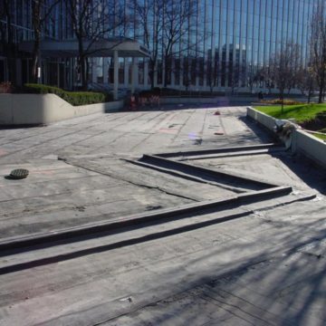 During: Watertight, factory-fabricated transitions in the EMSEAL MIGUTAN joint system are integrated into the deck waterproofing to create a continuous, waterproof deck system.