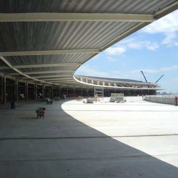 Migutan follows the curve on the departures roadway at the new Jet Blue terminal.