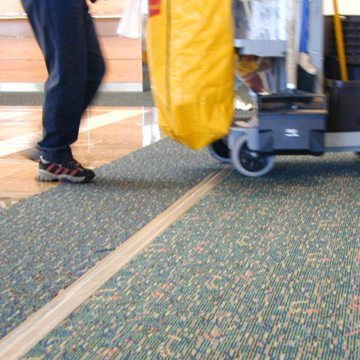 Expansion joint covers Migutrans FS 75 handles cleaning cart traffic at Orlando Airport Southwest terminal.
