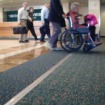 Expansion joint covers FS 75 handles wheelchair traffic at Orlando Airport Southwest terminal.