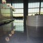 Airport floor expansion joint MIGUTRANS 75/… integrates unobtrusively with terrazzo flooring in Tampa International Airport.