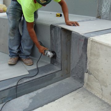 expansion joints in stadium adjusted for cover plates EMSEAL