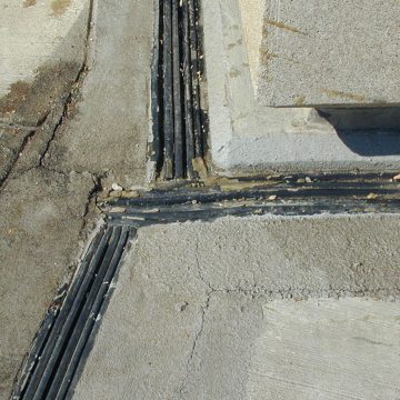 Failed stadium plaza deck expansion joint