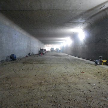 The tunnel is 620 Meters long (2,033 FT). The roof was poured in 50 sections.