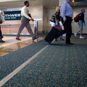 Expansion joint covers Migutrans FS 75 handles luggage traffic at Orlando Airport Southwest terminal.