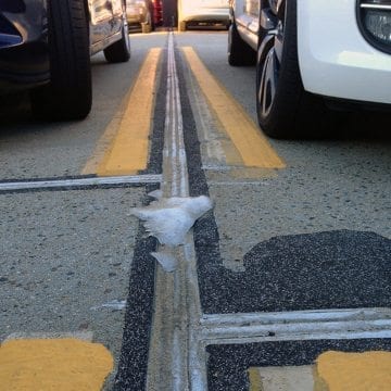 DSM System with grit ice Emcrete nosing on parking deck EMSEAL