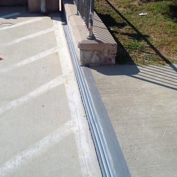 Parking garage expansion joint driveway to deck to wall DSM System from EMSEAL
