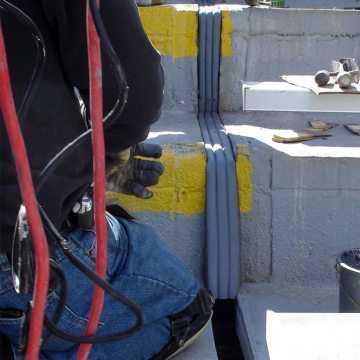 The inherent backpressure of the impregnated foam backing causes the material gradually to expand.