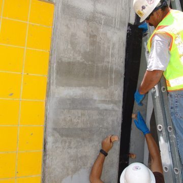 20H System foam inserted into wet epoxy on joint faces. Wedges temporarily hold the material in place as it self-expands.