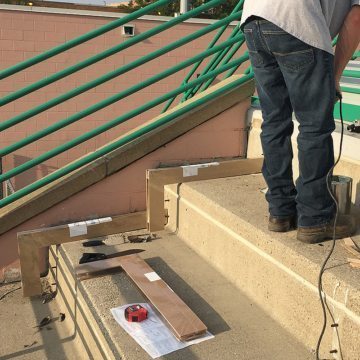Mixing epoxy for the installation of EMSEAL's DSM Custom 90s for South Side Archers Stadium.