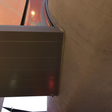 Expansion joint at skybridge to TWA Hotel Seismic ColorSeal by Emseal