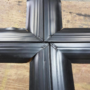 Roof expansion joint transition with offset cross - RoofJoint Emseal