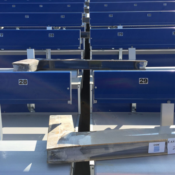Factory fabricated custom 90-degree tread and riser stadium expansion joint transitions - DSM Emseal