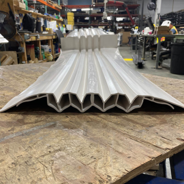 8-inch Seismic Roof expansion joint watertight vertical transition on Sika Emseal's shop floor