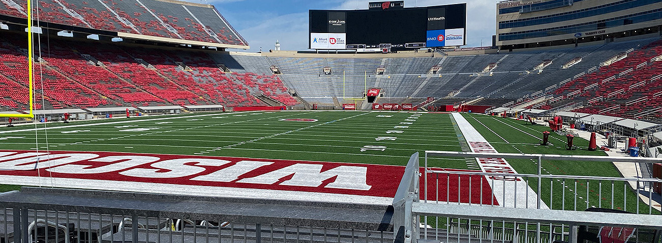 Stadium expansion joint retrofit at U of Wisconsin Badgers Camp Randall Field stadium using Sika Emseal SJS, and DSM System