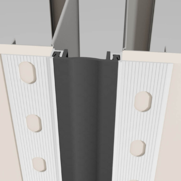 Wabo®CorridorWrap interior wall drywall surface mounted expansion joint cover plate by Sika Emseal - Exposed metal fins shown prior to application of joint compound
