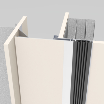 Wabo®SeisMaxPlus NBW interior corner wall and ceiling seismic recessed flush expansion joint cover plate system with wall panel inserted by Sika Emseal