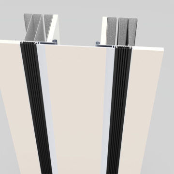 Wabo®SeisMaxPlus NBW interior wall and ceiling seismic recessed flush expansion joint cover plate system with wall panel inserted by Sika Emseal