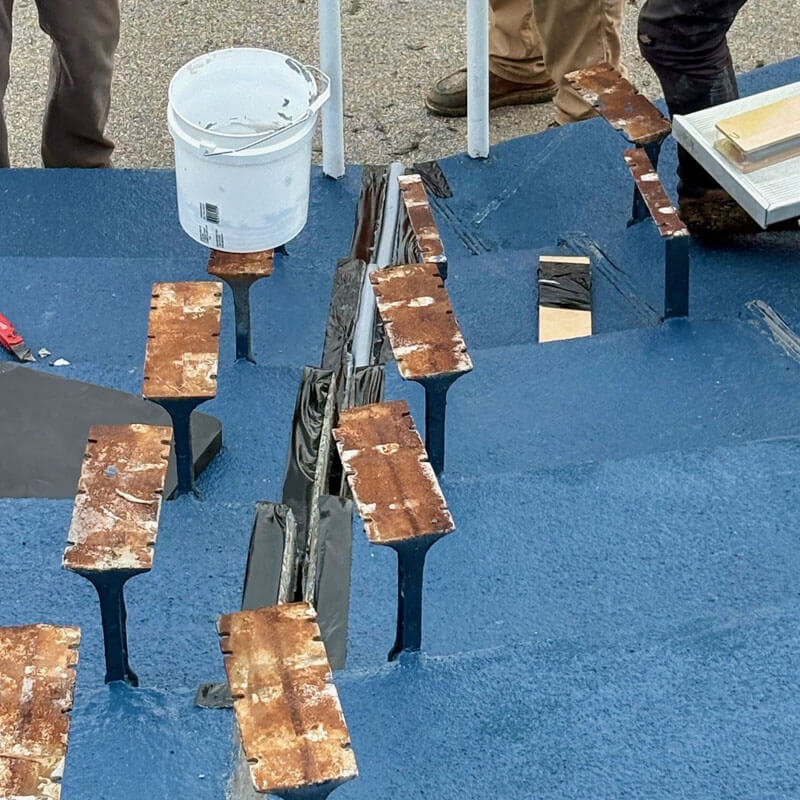 Sealing the stadium sealant joints at Villanova Football Stadium with custom fabricated DSM System Tread & Riser transitions by Sika Emseal.