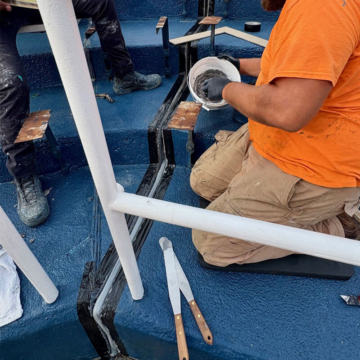 Stadium waterproofing the expansion joints in the tread and risers at Villanova University Stadium with the DSM System by Sika Emseal.