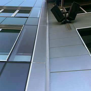 Vertical wall expansion joint running up stadium exterior.