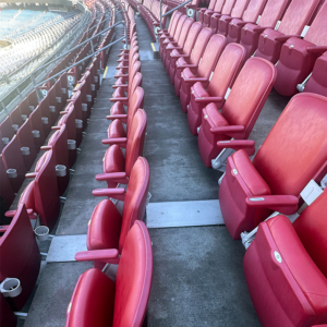 Expansion joint cover plate detail on stadium stairs.