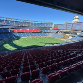 Wide view of Gillette Stadium seating bowl with expansion joint visible.