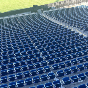 Expansion joint cover plate integrated into stadium stair design.