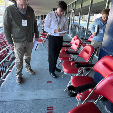Sika Emseal technical sales and engineering team reviewing an installed stadium expansion joint system during a field walkthrough at Gillette Stadium.