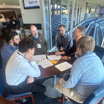 Sika Emseal technical and engineering team reviewing stadium expansion joint installation conditions, detailing, and transition challenges during a field walkthrough at Gillette Stadium.