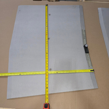 28‑inch‑wide coverplate manufactured for the curved ADA‑compliant expansion joint used in the SFMTA project.