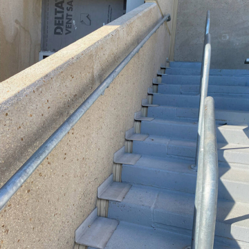 Expansion joint with coverplate sealing stairs of treads and risers at Camp Randall Stadium in Madison, WI