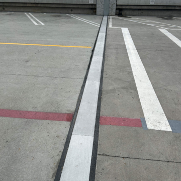 SJS-FR2 fire-rated seismic expansion joint installed on open parking deck at IKEA Palo Alto, East Palo Alto, California