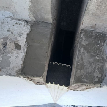 Cross-section detail of double-sided Seismic Colorseal-DS expansion joint prior to final installation, showing foam and silicone bellows profile.