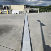 SJS expansion joint installed on a parking deck at the Hartsfield-Jackson Atlanta International Airport Rental Car Center (RCC).
